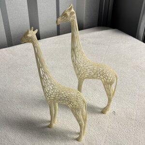 Elegant Cream Giraffe Sculptures